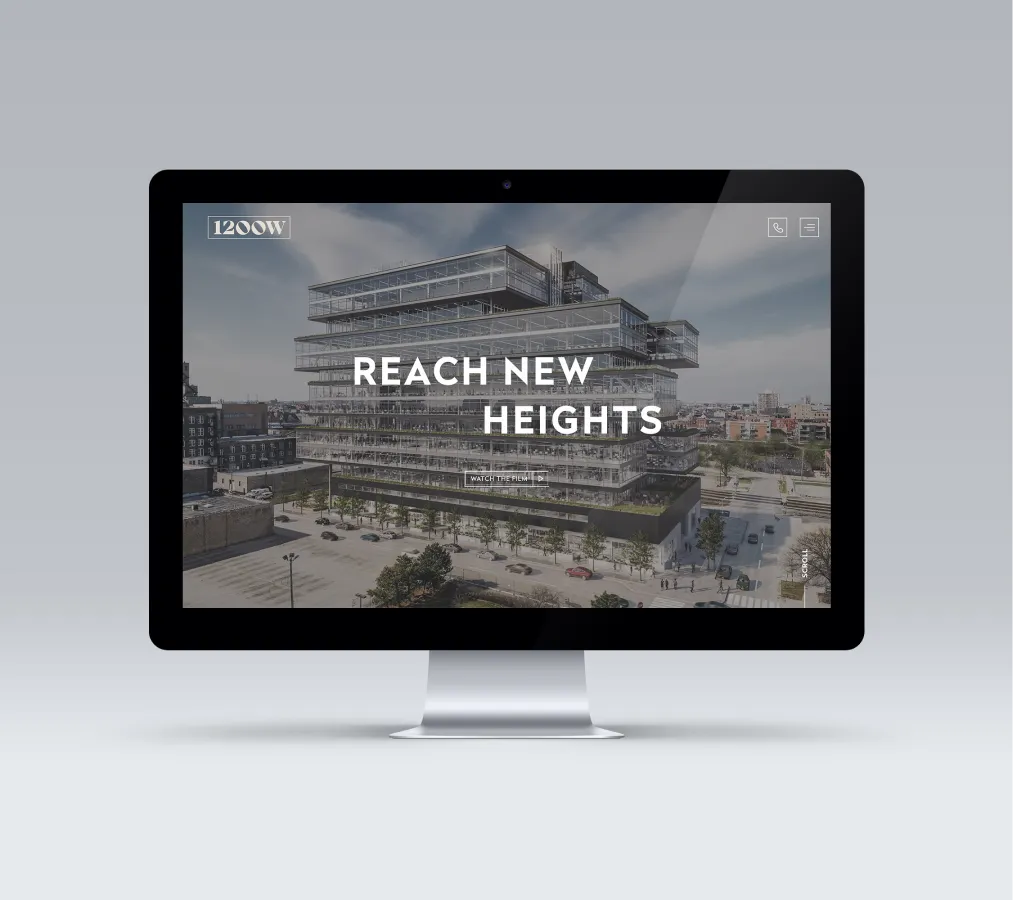 Real estate website homepage featuring a modern office development and bold typography