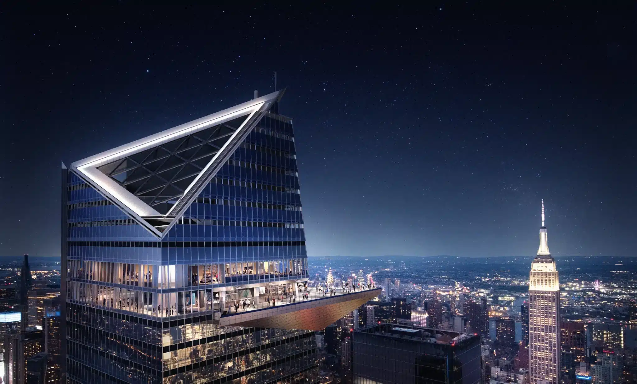 The Edge’s triangular design and glass balcony overlooking the Empire State Building at night
