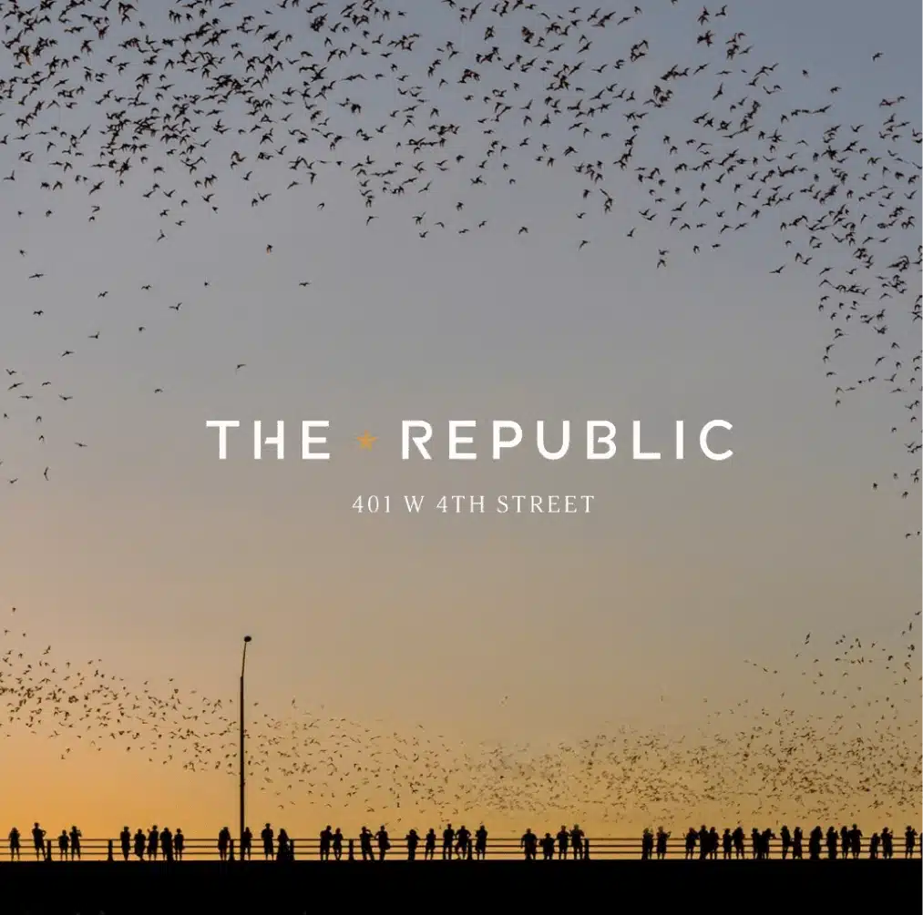 Silhouetted crowd on a bridge with bats flying against an Austin sunset, featuring The Republic branding