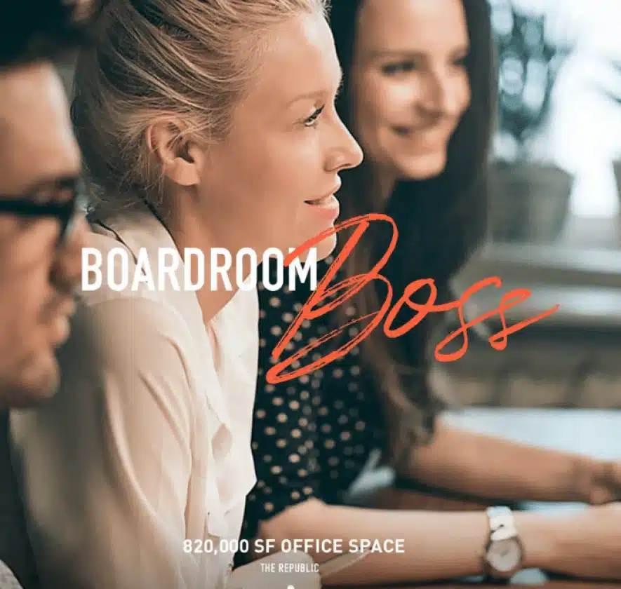 Business professionals in a modern office setting with ‘Boardroom Boss’ branding for The Republic