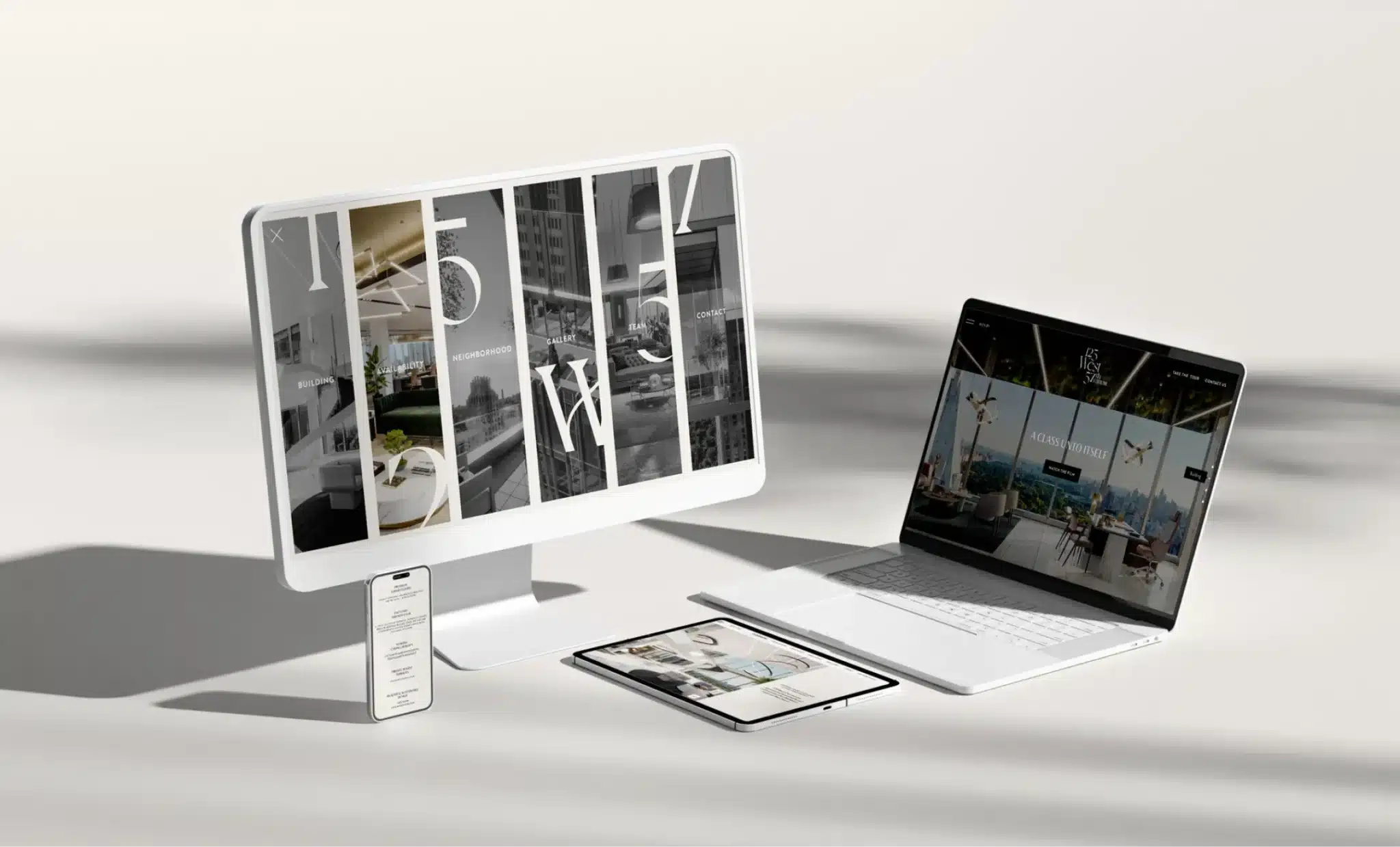 Website design mockup for a luxury office development displayed on desktop and mobile devices