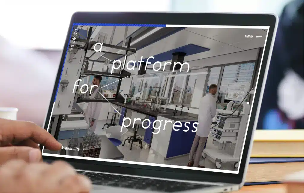 Digital experience of Innolabs' innovative lab spaces displayed on a laptop screen