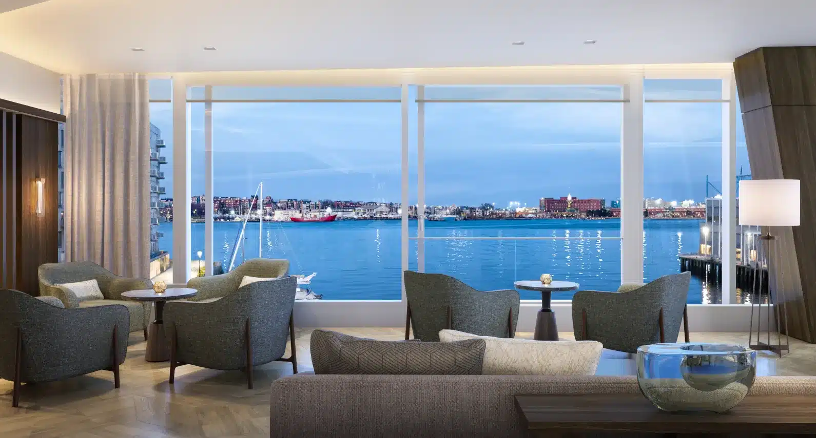 Elegant waterfront lounge with panoramic city views and plush seating