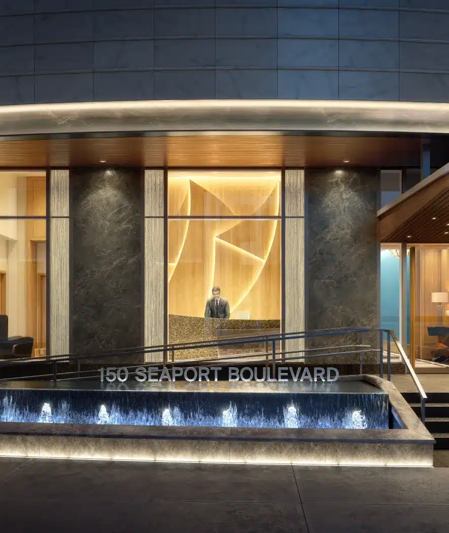 Grand entrance of St. Regis Boston at 150 Seaport Boulevard, featuring modern architecture