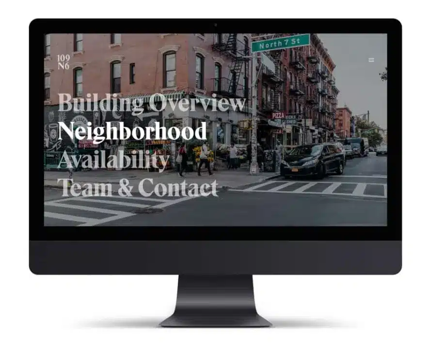 Website mockup for 109 N6 displayed on a sleek black desktop monitor, showing navigation menu