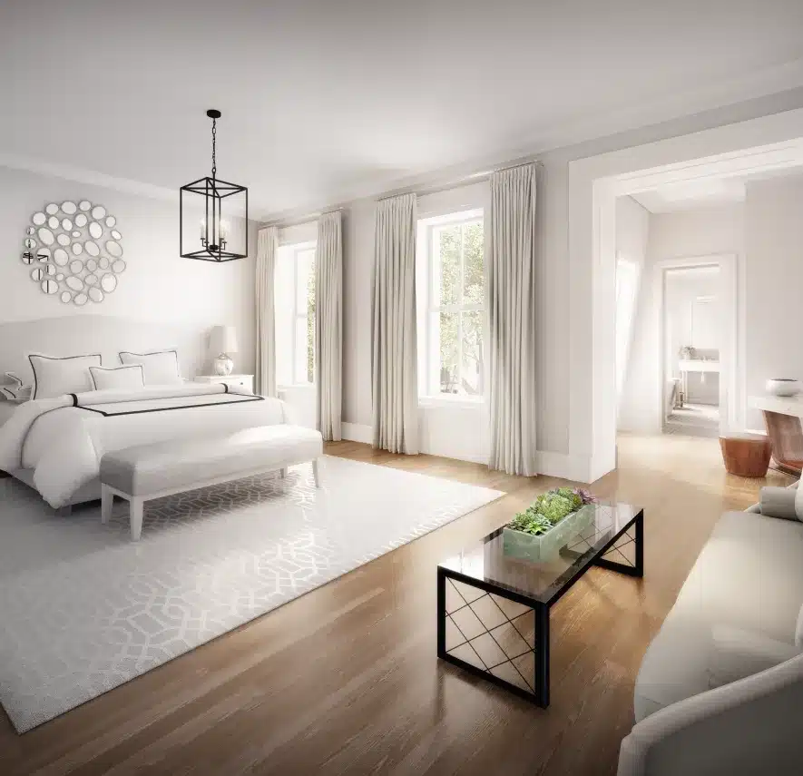 Serene bedroom with soft neutral tones, elegant bedding, and a large window with natural light