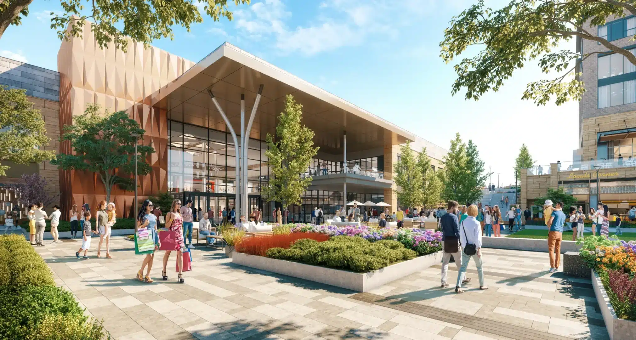 Modern shopping destination featuring contemporary design, outdoor seating, and lush landscaping