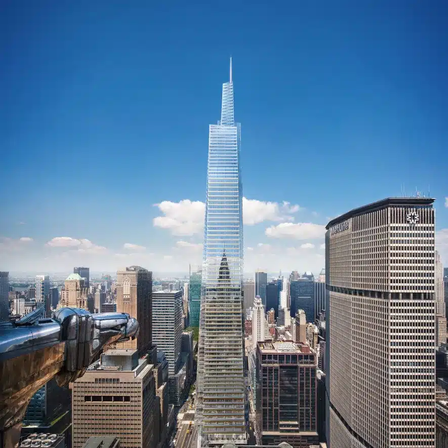 Clear blue sky framing a sleek, reflective high-rise skyscraper in the heart of the city