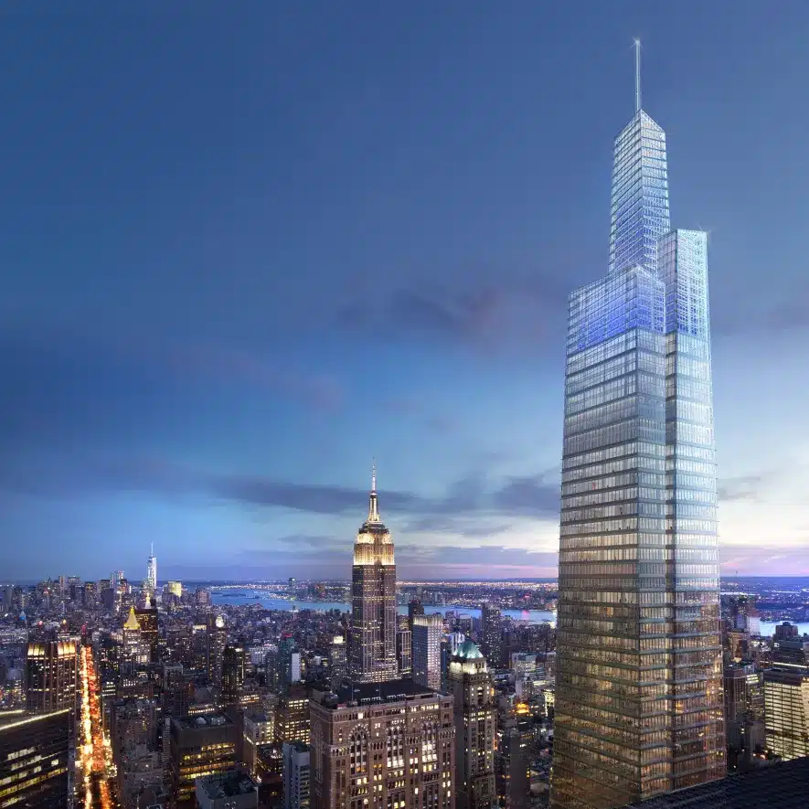 Majestic city skyline at twilight featuring a modern skyscraper and the Empire State Building