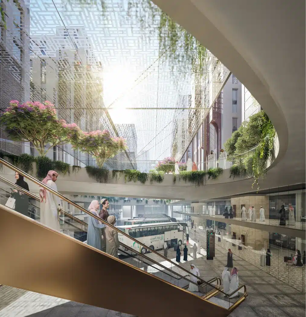 Modern underground transit hub in Rua Al Madinah with escalators and lush greenery