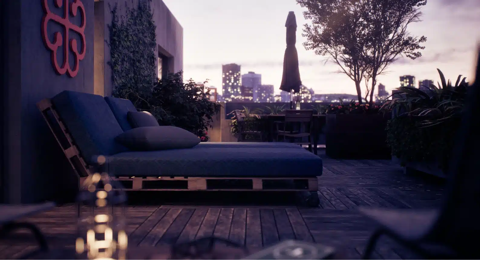 Rooftop patio scene with wooden deck, plants and lounge furniture overlooking downtown skyline at twilight