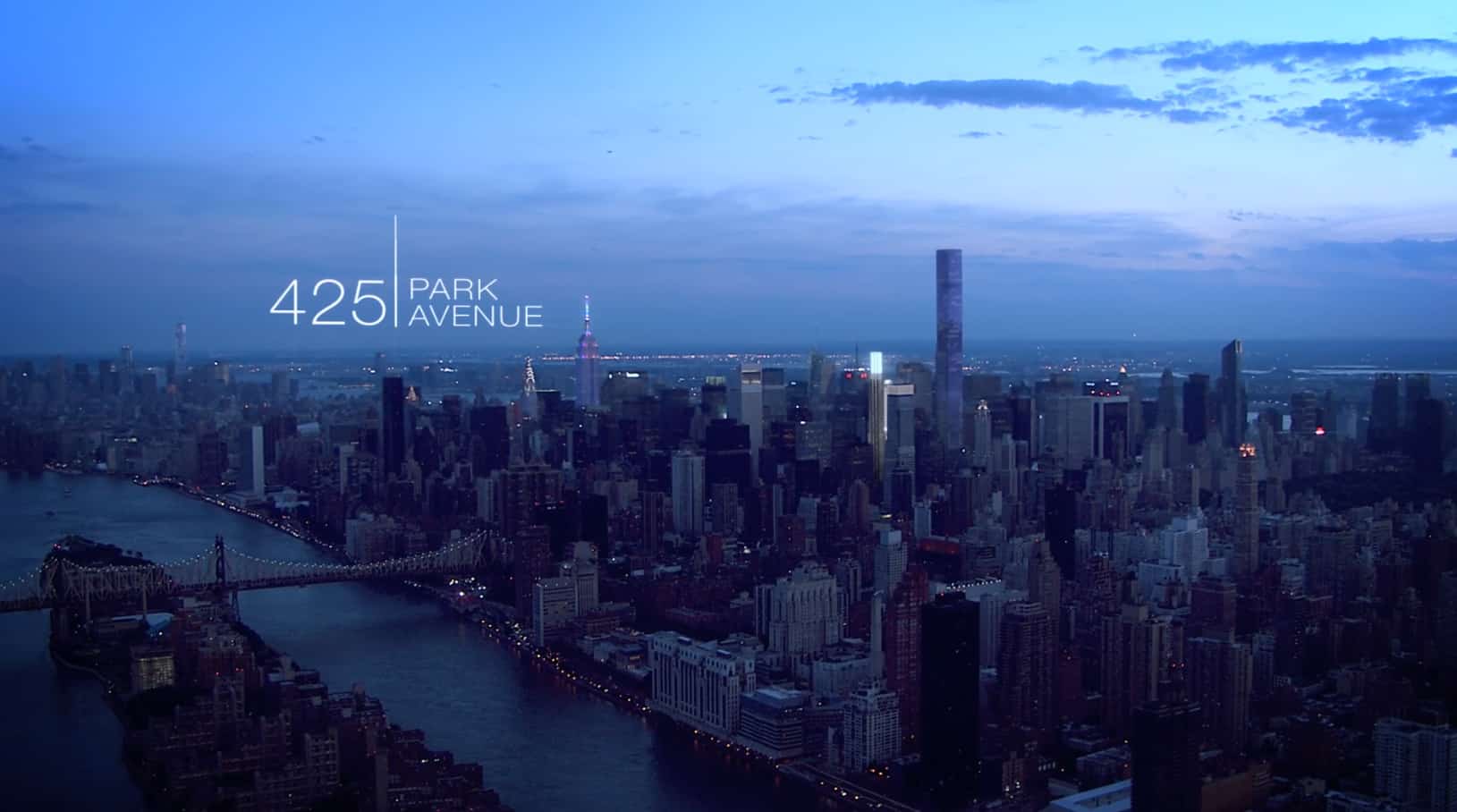 Cityscape view of Manhattan skyline at twilight emphasizing real estate destination