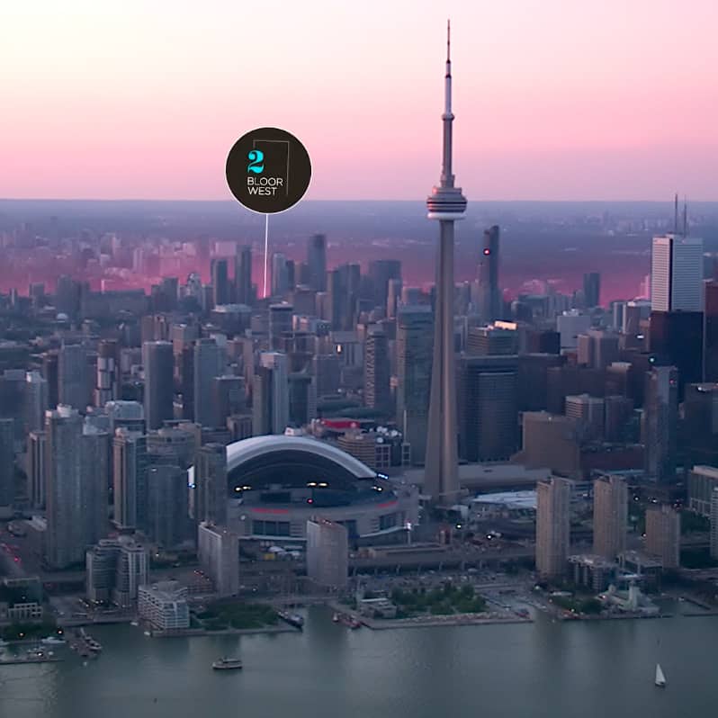 Toronto skyline at dusk with CN Tower and highlighted location for 2 Bloor West development
