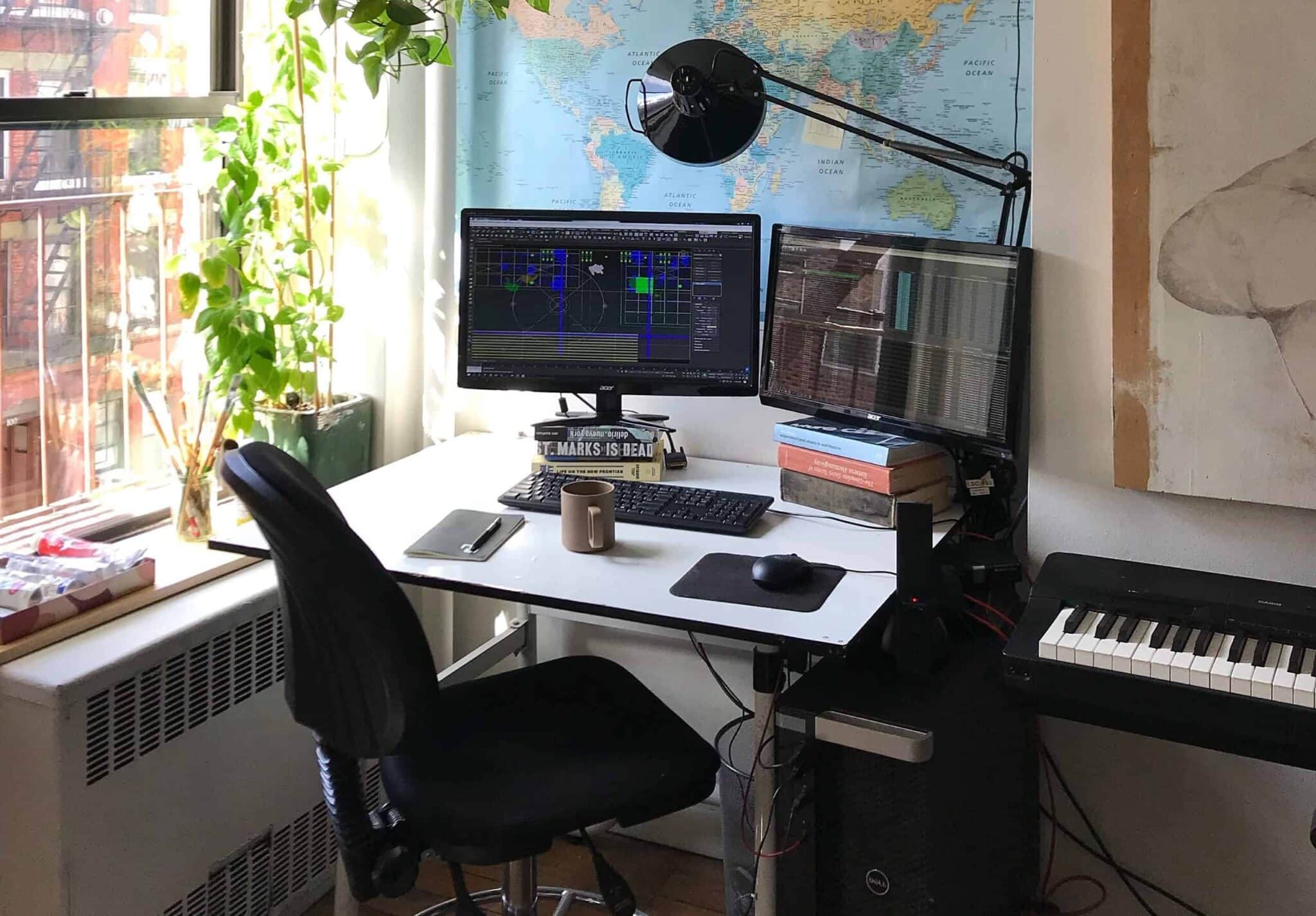 Cozy home office workspace with dual monitors, books, plants, and bright natural window light