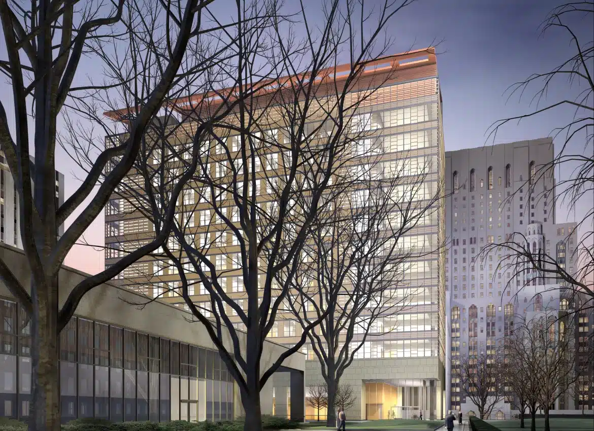 Architectural rendering of modern institutional building with illuminated windows and leafless winter trees