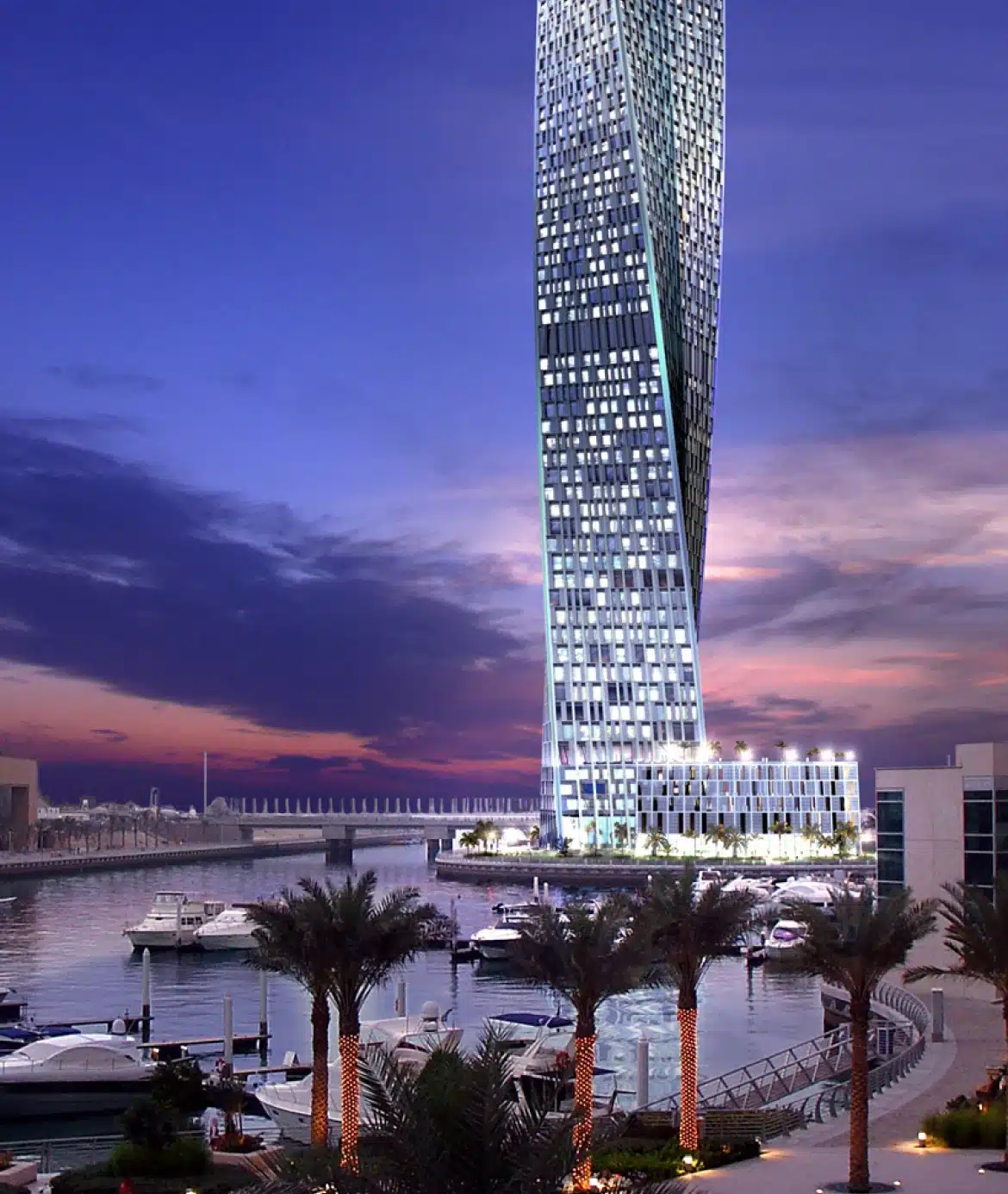 Dubai Infinity Tower twisting skyscraper rendering beside marina waterfront with luxury yachts and palm trees