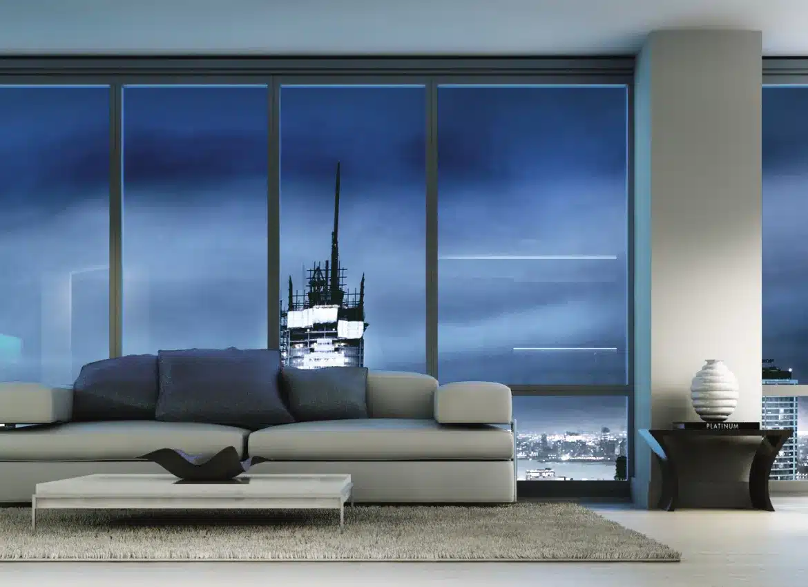 Contemporary living room featuring city skyline backdrop and sleek minimalist design with modern furniture