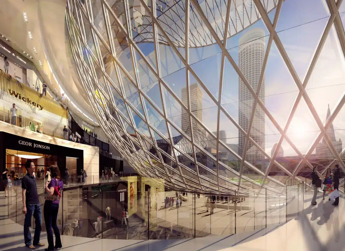 Luxurious shopping and hotel interior rendering with sweeping curved glass walls overlooking city skyscrapers outside