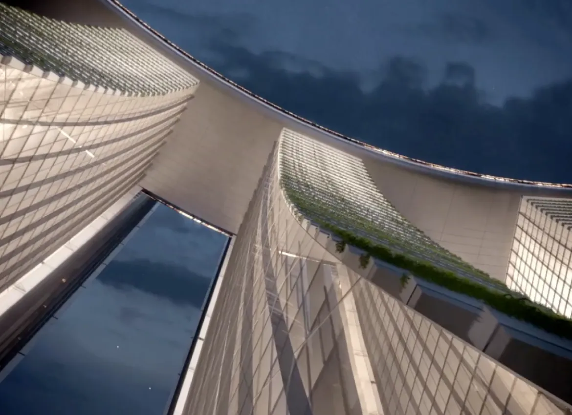 Dramatic upward view of futuristic skyscraper towers with skybridge at twilight evening sky