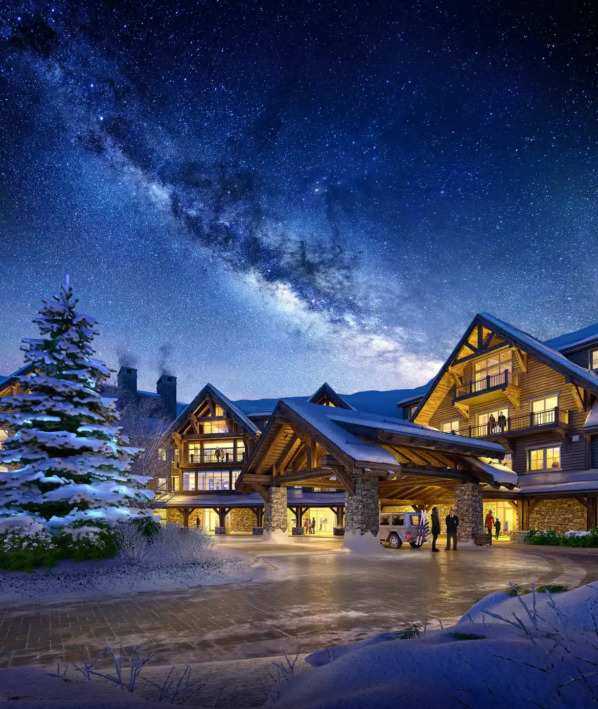 Winter lodge illuminated warmly with breathtaking starlit night sky above snowy landscape