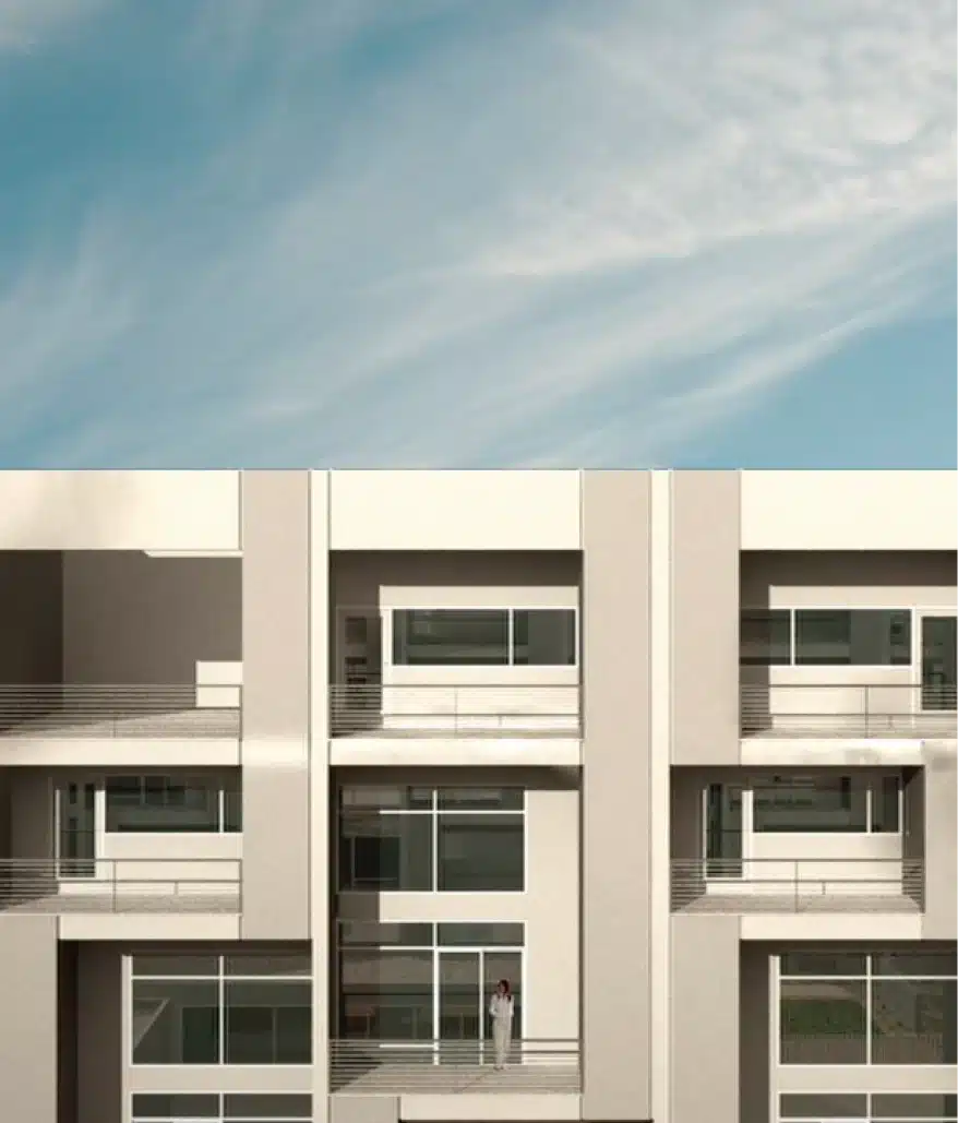 Modern apartment building facade with balconies and glass windows featuring person standing outside