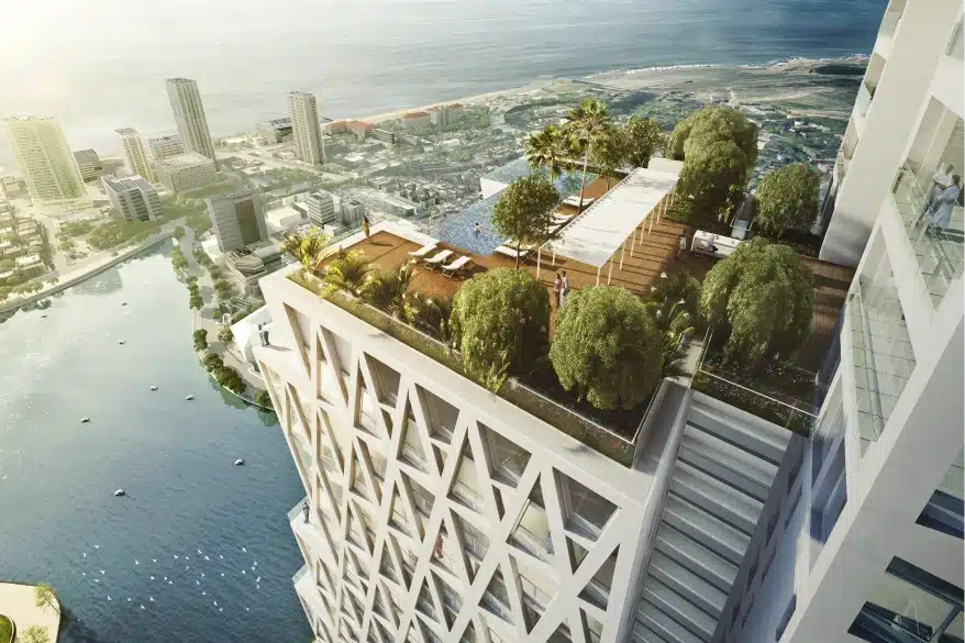 Rooftop garden terrace with infinity pool overlooking city skyline and ocean horizon views