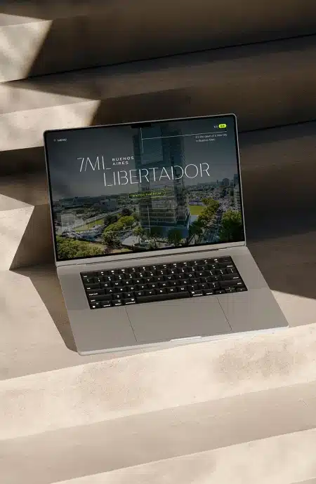 Commercial property website displayed on laptop highlighting office development, modern architecture, and responsive web design