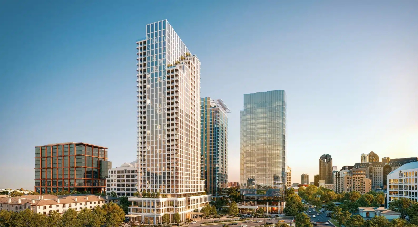 Modern residential tower in downtown Dallas featuring glass facade alongside contemporary high rises