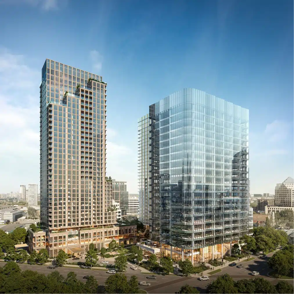 Contemporary Dallas high rise residential and office towers with street level retail and landscaped surroundings