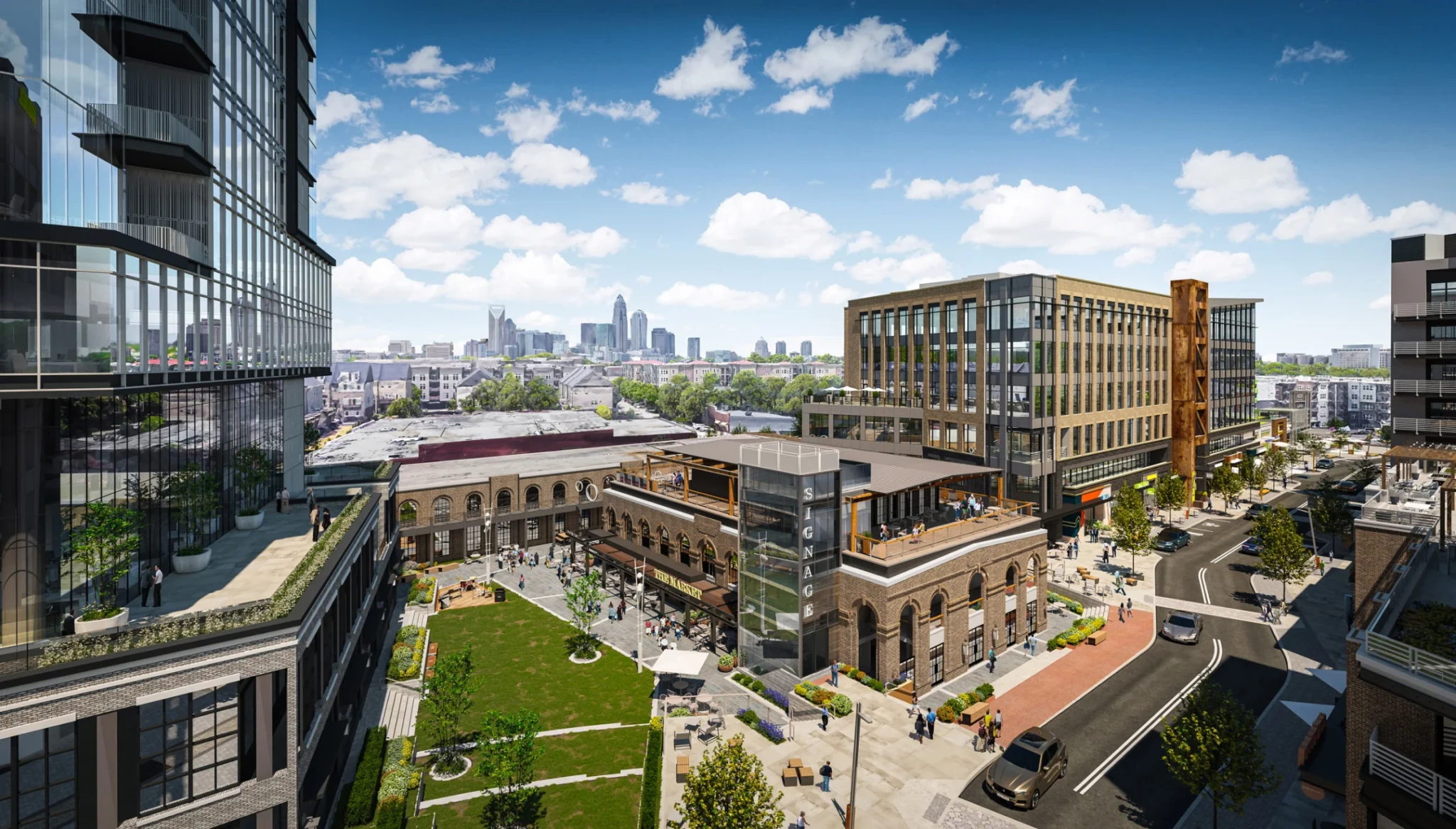 Modern city district with landscaped courtyard, brick architecture, rooftop terraces, and commercial spaces